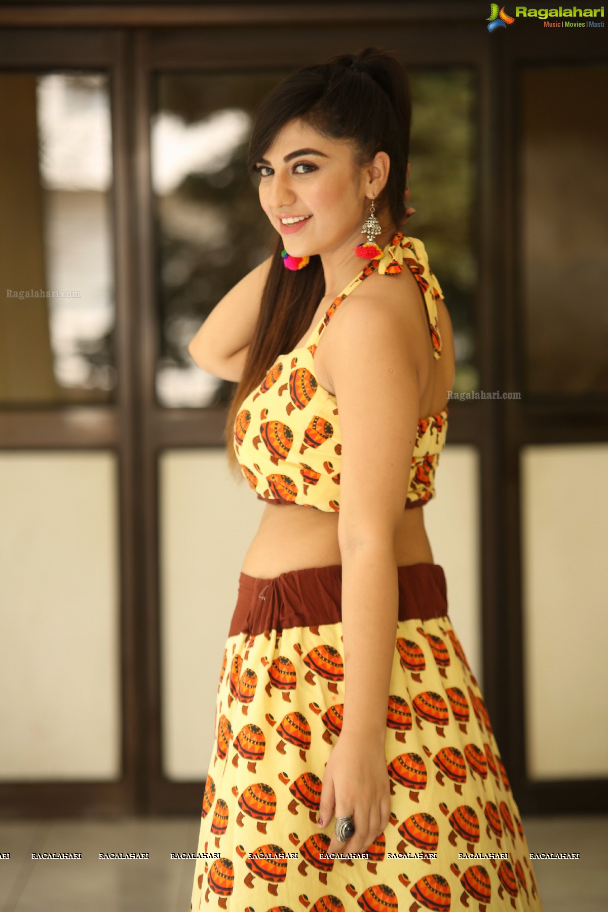 Harshitha Panwar in Yellow and Brown Printed Crop Top and Long Skirt, Photo Gallery