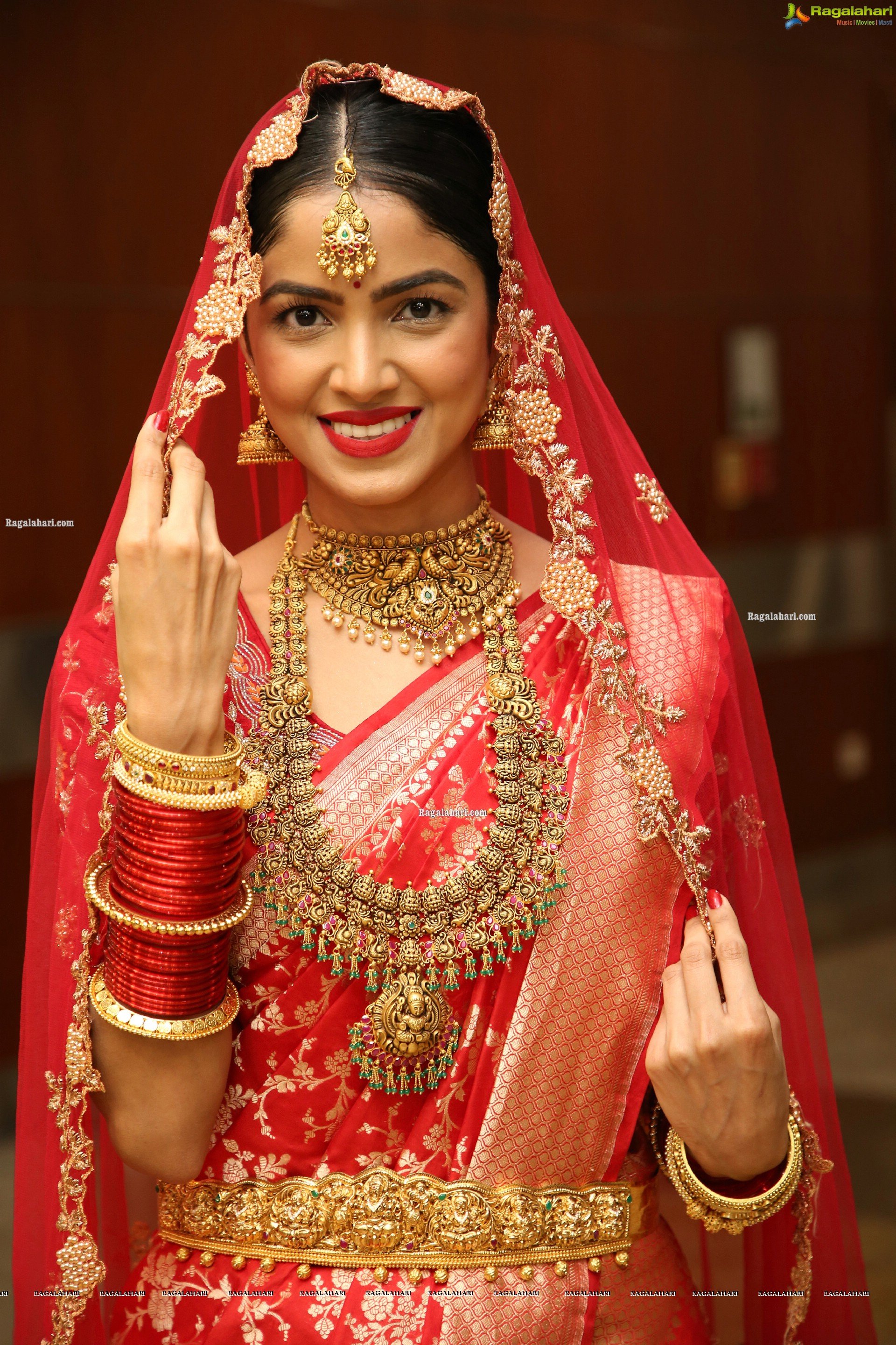 Drishika Chander in Bridal Red and Stunning Ornaments, HD Photo Gallery
