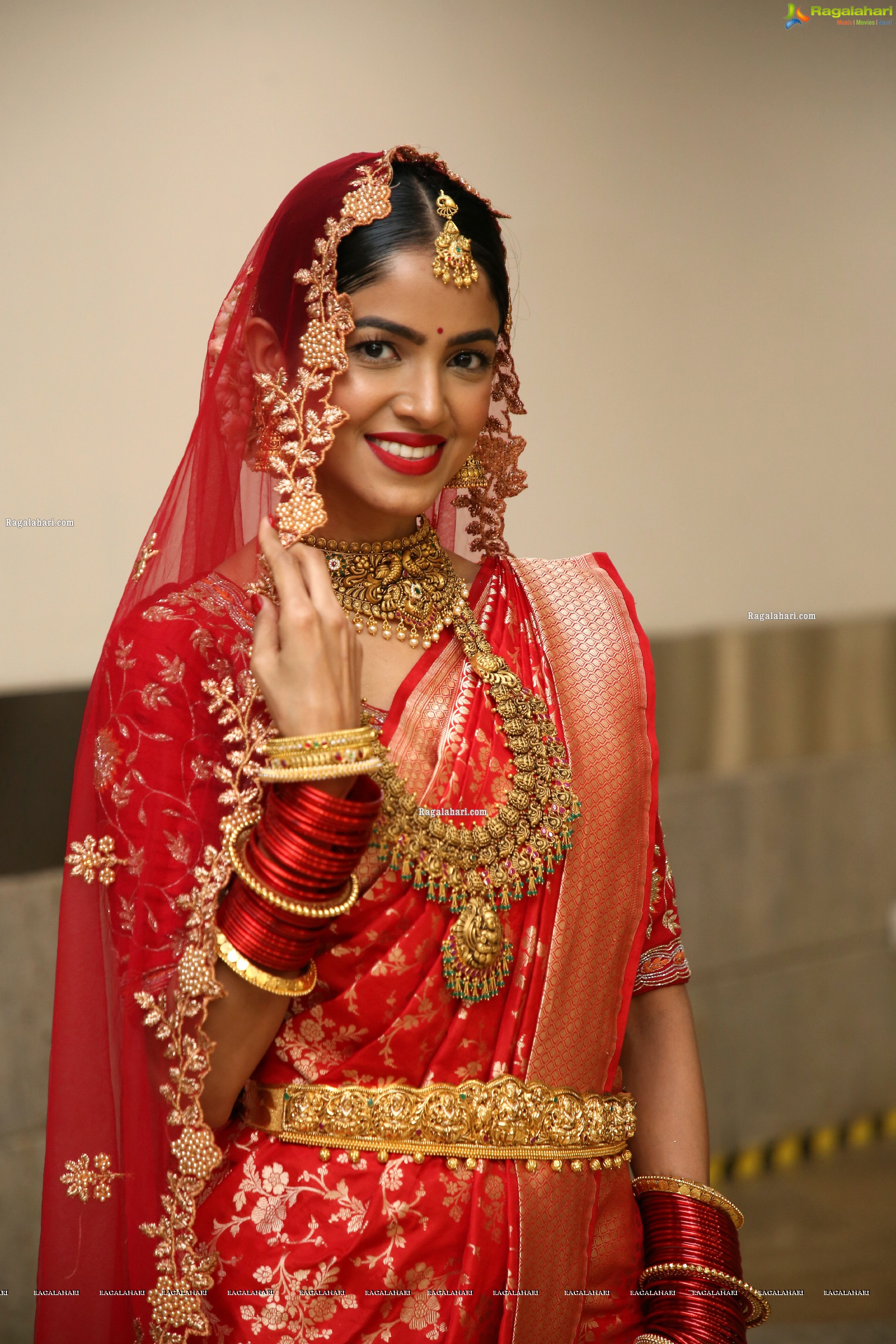 Drishika Chander in Bridal Red and Stunning Ornaments, HD Photo Gallery