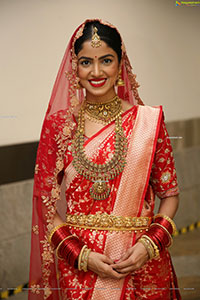 Drishika Chander in Bridal Red and Stunning Ornaments