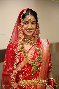 Drishika Chander in Bridal Red and Stunning Ornaments