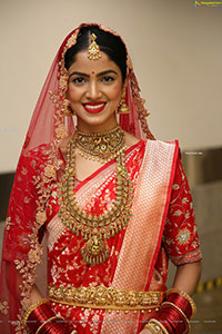 Drishika Chander in Bridal Red and Stunning Ornaments