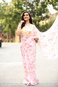 Manjusha in Light Pink Georgette Floral Saree