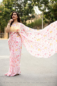 Manjusha in Light Pink Georgette Floral Saree