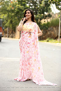 Manjusha in Light Pink Georgette Floral Saree