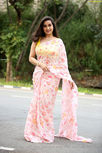 Manjusha in Light Pink Georgette Floral Saree