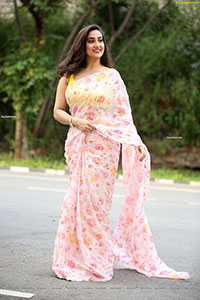 Manjusha in Light Pink Georgette Floral Saree