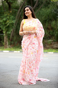 Manjusha in Light Pink Georgette Floral Saree