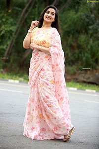 Manjusha in Light Pink Georgette Floral Saree