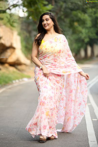 Manjusha in Light Pink Georgette Floral Saree