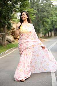 Manjusha in Light Pink Georgette Floral Saree