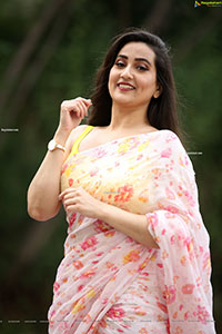 Manjusha in Light Pink Georgette Floral Saree