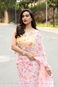 Manjusha in Light Pink Georgette Floral Saree