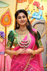 Varshini Sounderajan Poses With Gold Jewellery