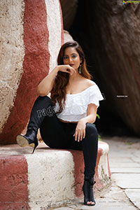 Dhriti Patel in White One-shoulder Ruffled Crop Top