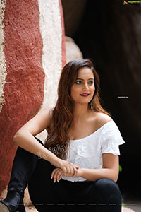 Dhriti Patel in White One-shoulder Ruffled Crop Top