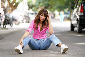 Supriya Keshri in Pink Shirt and Ripped Jeans