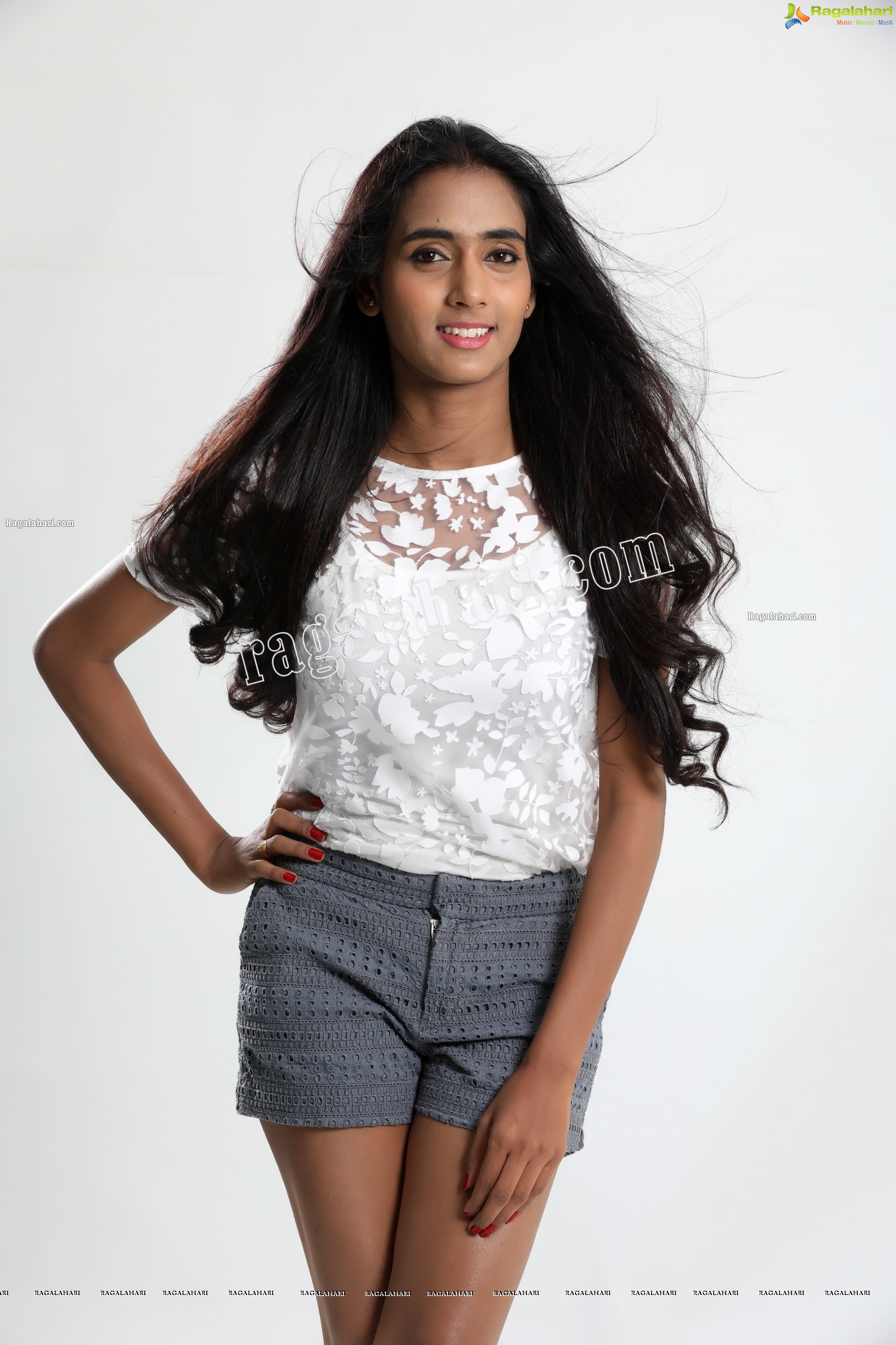 Bharathi Parli in White Top and Denim Shorts Exclusive Photo Shoot