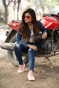 Rishika Nisha Posing on Motorcycle