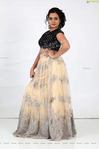 VJ Jaanu in Champagne Lehenga and Black Sequin Blouse