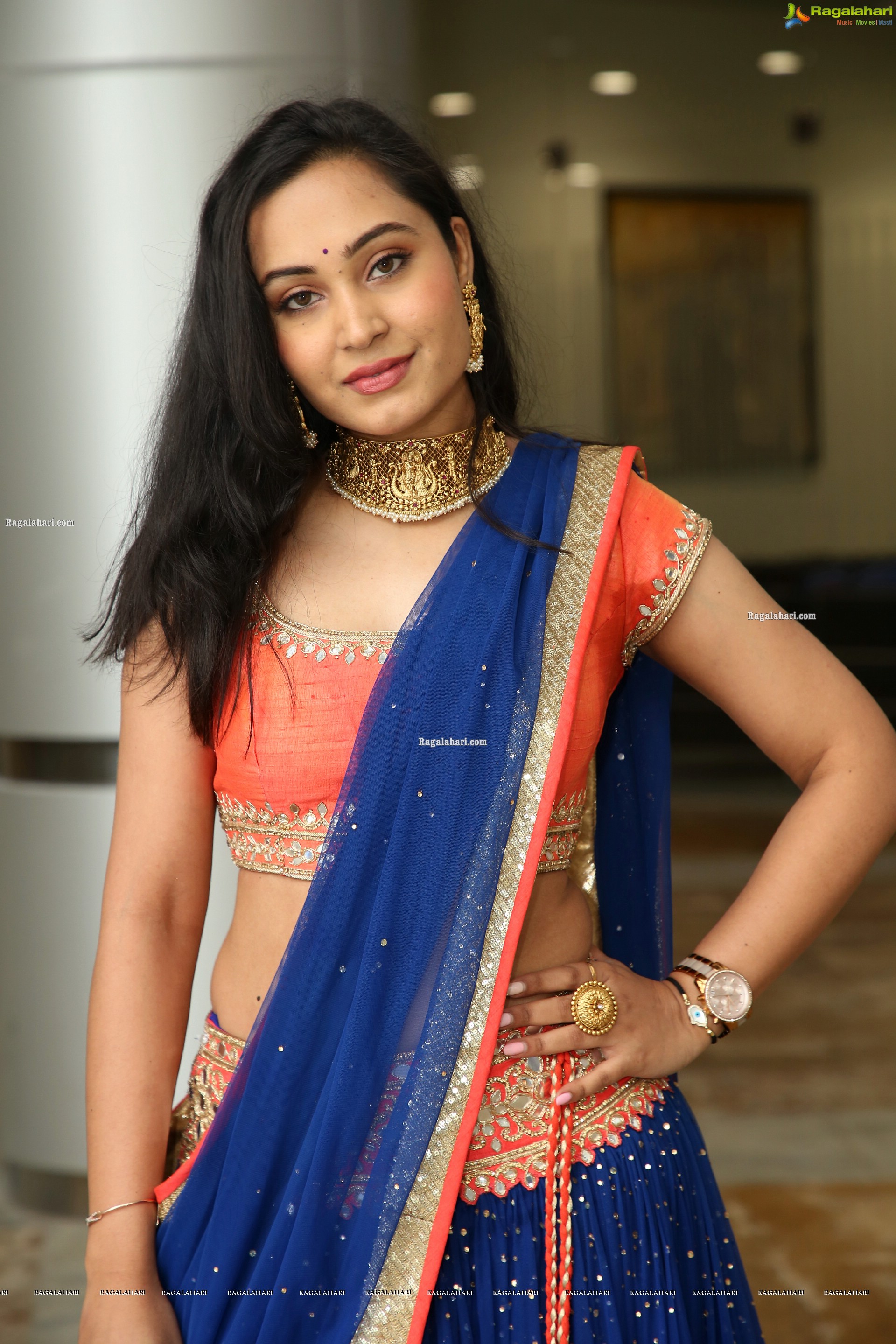 Vennela Amiga Stills in Blue and Orange Designer Lehenga Choli, HD Gallery