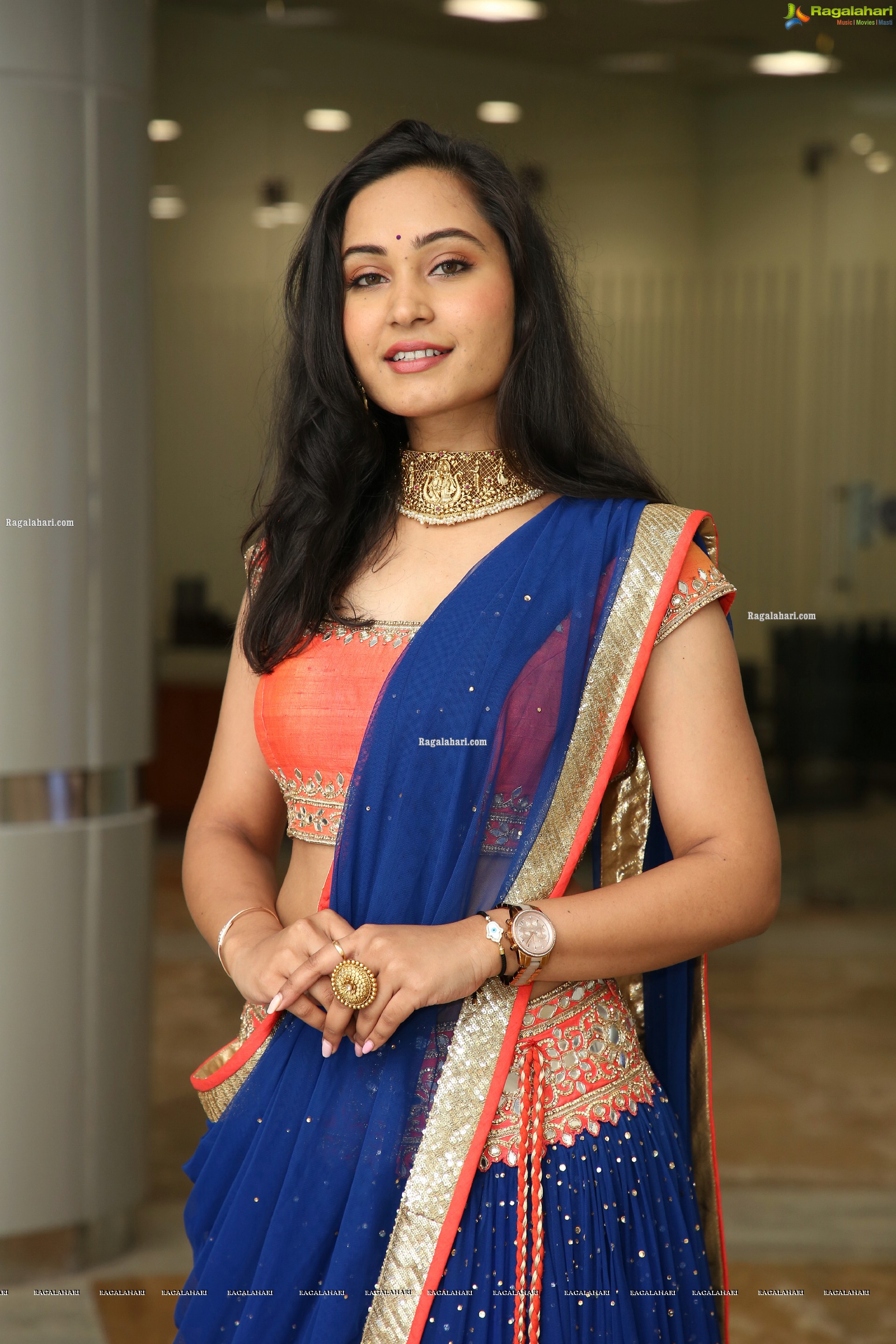 Vennela Amiga Stills in Blue and Orange Designer Lehenga Choli, HD Gallery