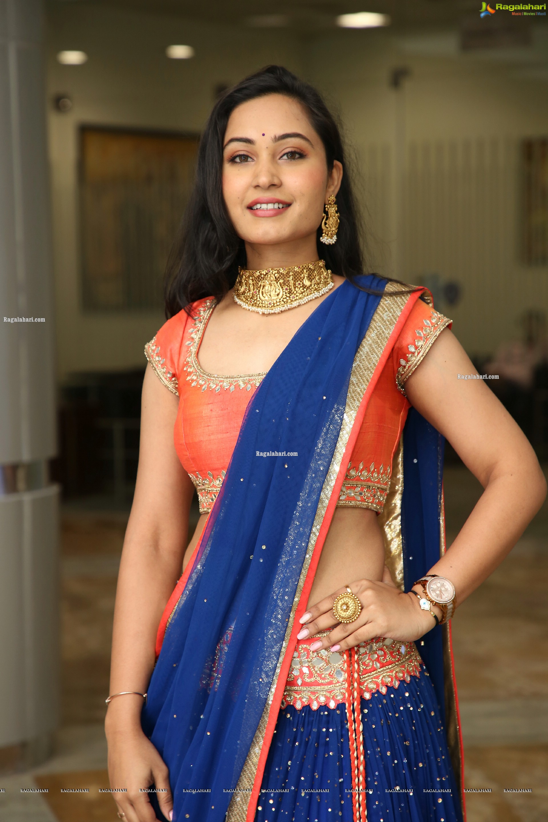 Vennela Amiga Stills in Blue and Orange Designer Lehenga Choli, HD Gallery