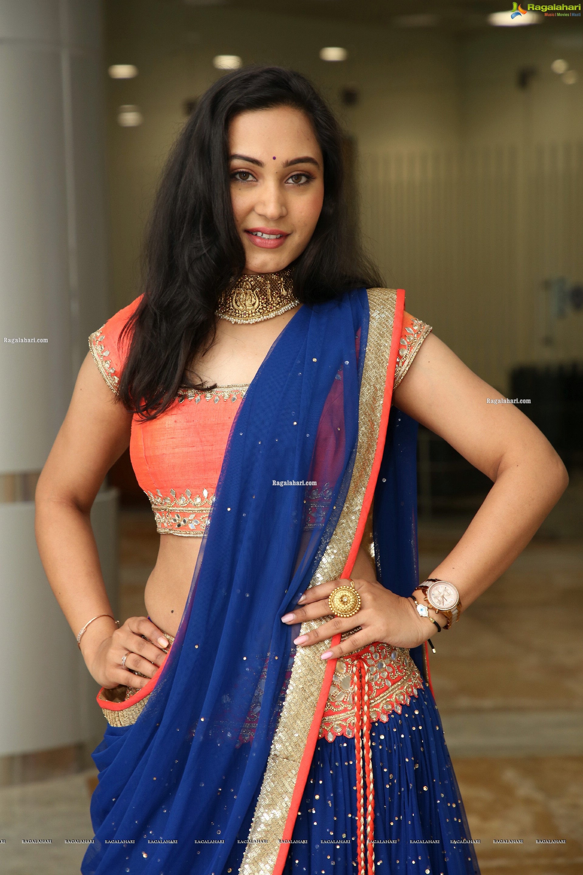 Vennela Amiga Stills in Blue and Orange Designer Lehenga Choli, HD Gallery