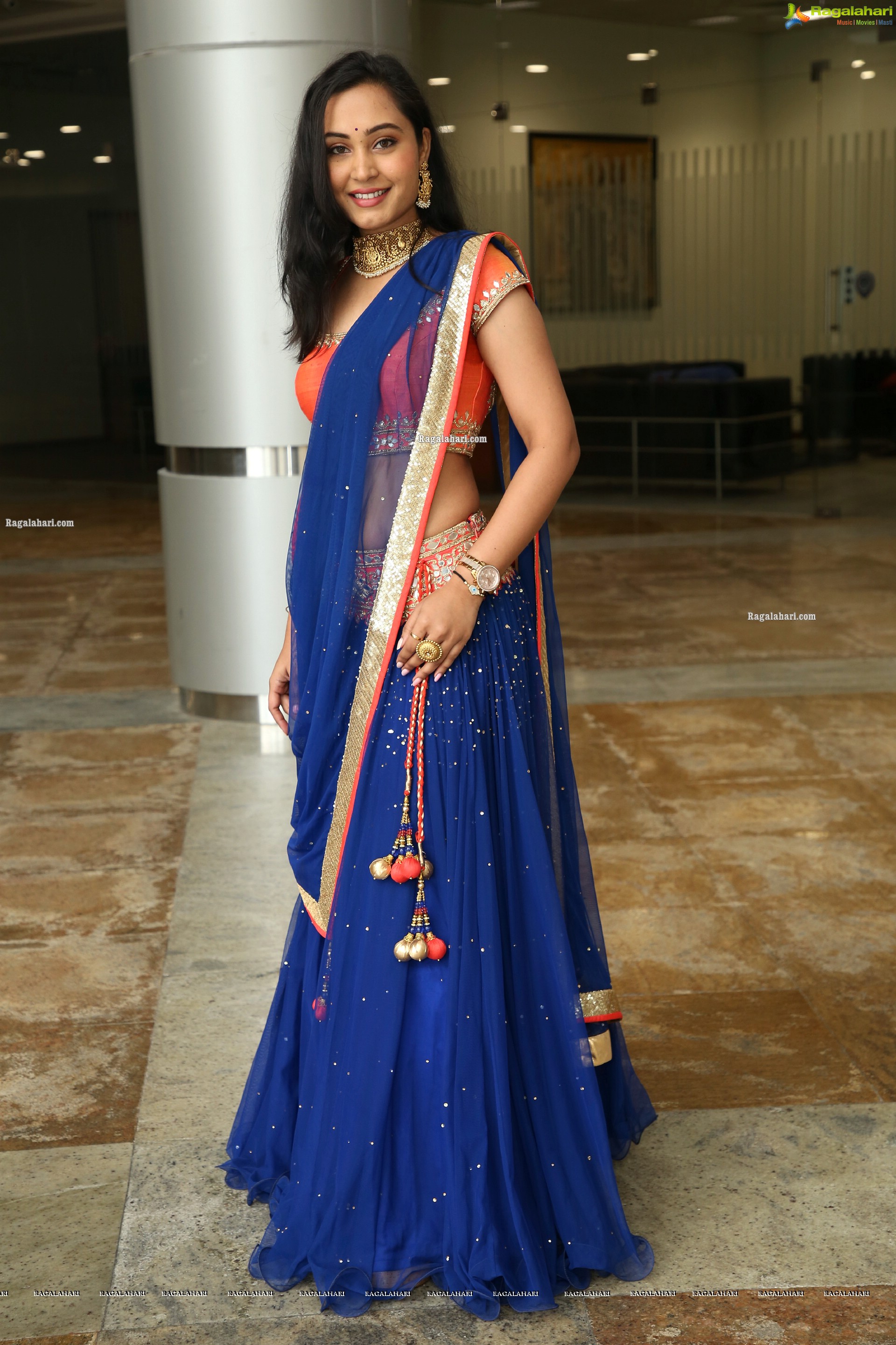 Vennela Amiga Stills in Blue and Orange Designer Lehenga Choli, HD Gallery