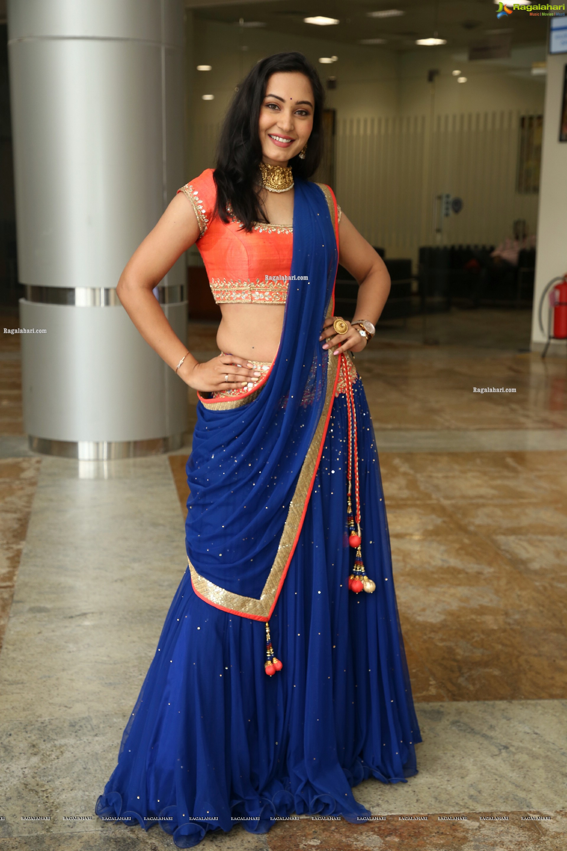 Vennela Amiga Stills in Blue and Orange Designer Lehenga Choli, HD Gallery