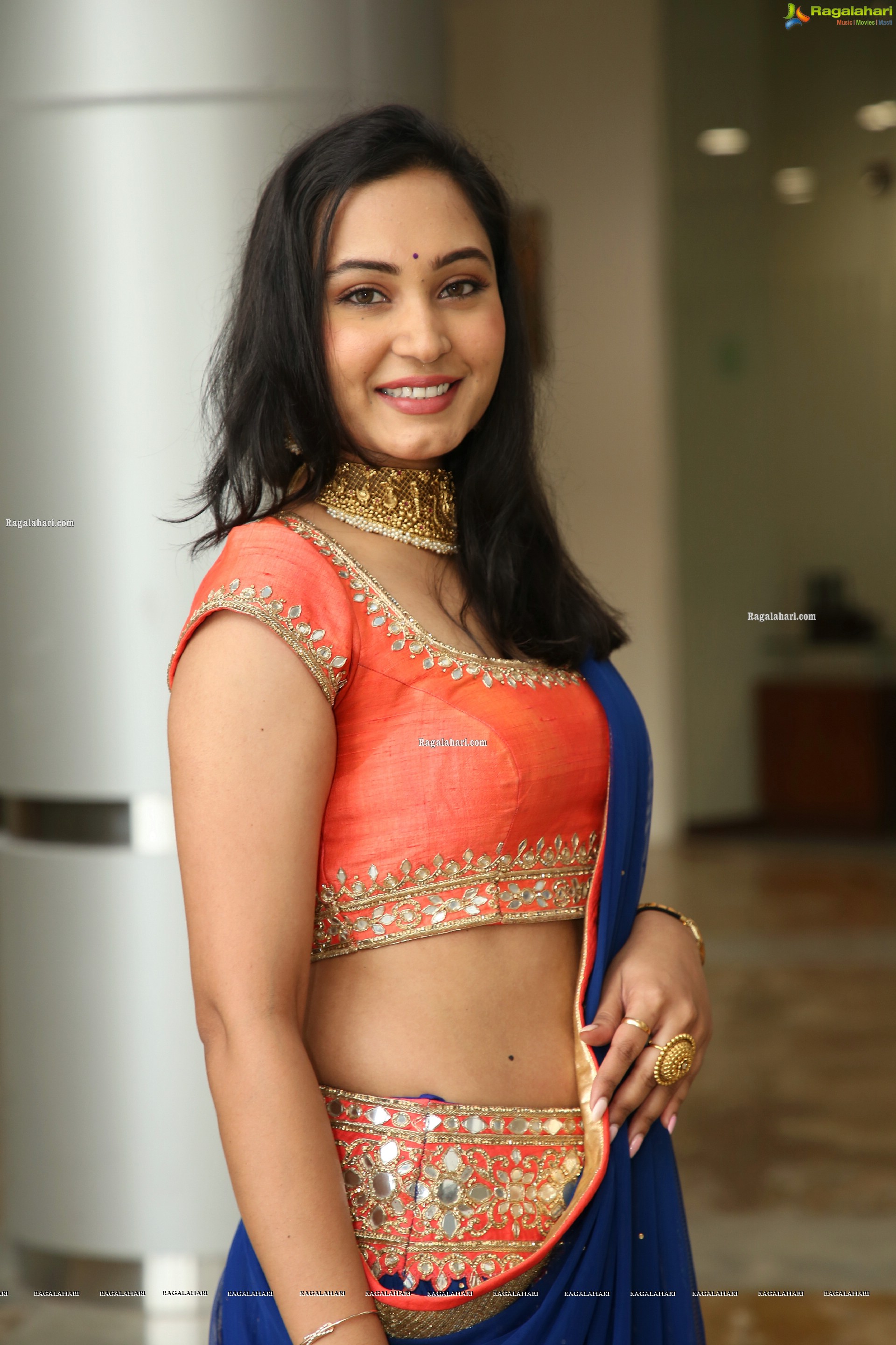 Vennela Amiga Stills in Blue and Orange Designer Lehenga Choli, HD Gallery