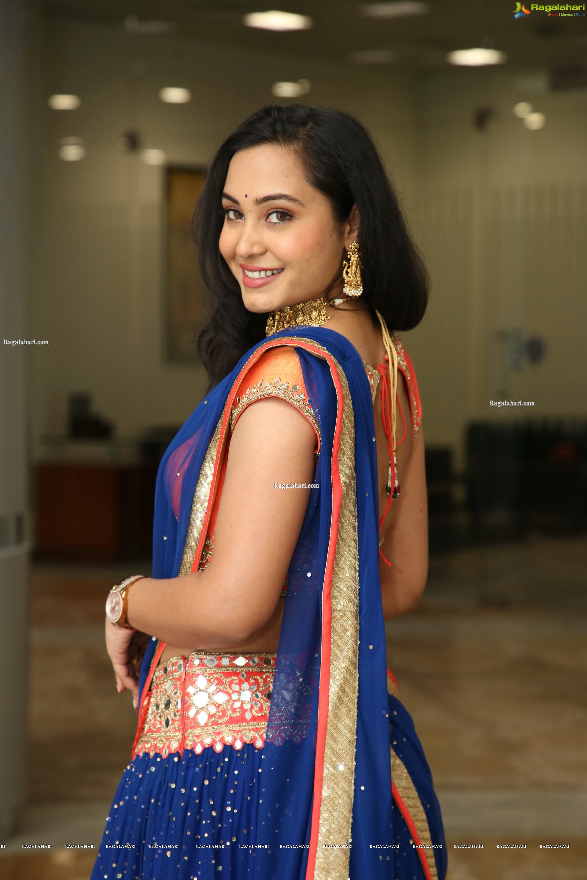 Vennela Amiga Stills in Blue and Orange Designer Lehenga Choli, HD Gallery