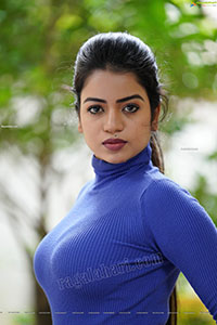 Bhavya Sri in Royal Blue Ribbed-Knit Turtleneck Top