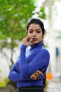 Bhavya Sri in Royal Blue Ribbed-Knit Turtleneck Top