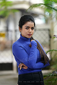 Bhavya Sri in Royal Blue Ribbed-Knit Turtleneck Top