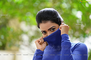 Bhavya Sri in Royal Blue Ribbed-Knit Turtleneck Top