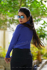 Bhavya Sri in Royal Blue Ribbed-Knit Turtleneck Top