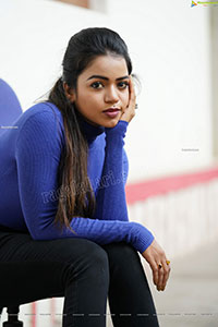 Bhavya Sri in Royal Blue Ribbed-Knit Turtleneck Top