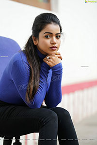 Bhavya Sri in Royal Blue Ribbed-Knit Turtleneck Top