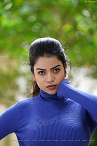 Bhavya Sri in Royal Blue Ribbed-Knit Turtleneck Top