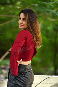 Tejal Tammali in Black Leather Mini Skirt and Red Top