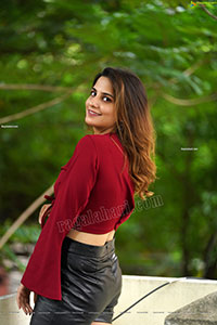 Tejal Tammali in Black Leather Mini Skirt and Red Top