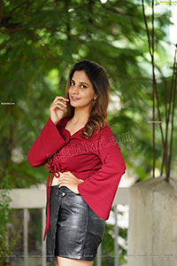 Tejal Tammali in Black Leather Mini Skirt and Red Top