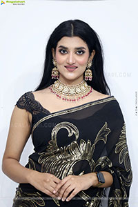 Navya Bale stills in Black Designer Saree, HD Gallery