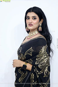 Navya Bale stills in Black Designer Saree, HD Gallery