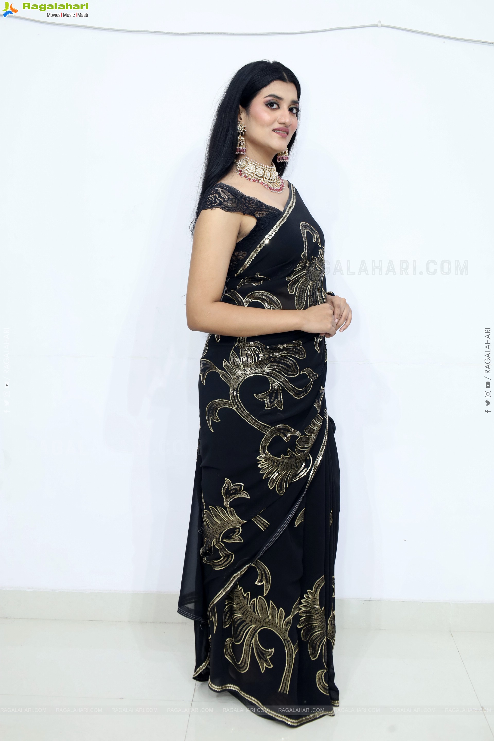 Navya Bale stills in Black Designer Saree, HD Gallery