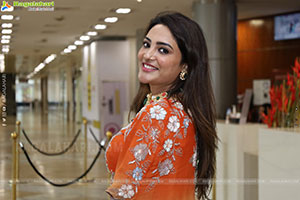 Nirupama stills in Orange Colour Designer Dress, HD Gallery