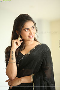 Dhashvika Gorgeous stills in Black Half Saree