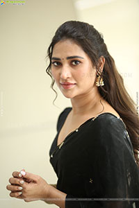 Dhashvika Gorgeous stills in Black Half Saree