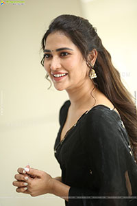 Dhashvika Gorgeous stills in Black Half Saree